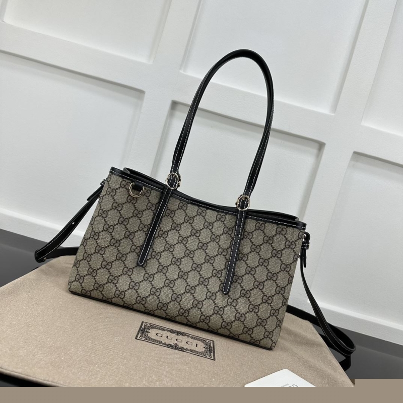 G*u*i shopping bags